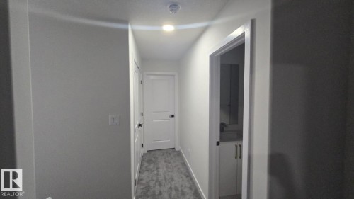 Mainfloor 338 Munn Way, Leduc, AB - Indoor Photo Showing Other Room