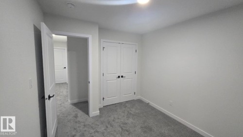 Mainfloor 338 Munn Way, Leduc, AB - Indoor Photo Showing Other Room