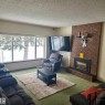 3105 130A Avenue, Edmonton, AB  - Indoor Photo Showing Living Room With Fireplace 