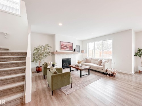 97 Joyal Way, St. Albert, AB - Indoor Photo Showing Living Room With Fireplace