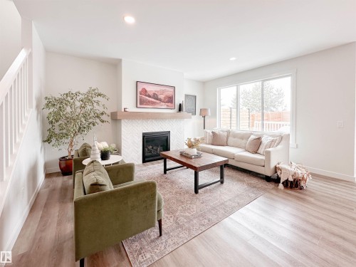 97 Joyal Way, St. Albert, AB - Indoor Photo Showing Living Room With Fireplace