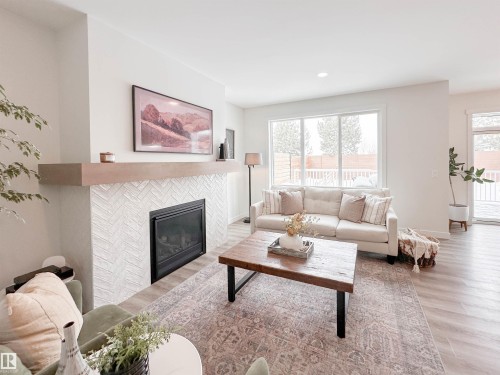 97 Joyal Way, St. Albert, AB - Indoor Photo Showing Living Room With Fireplace