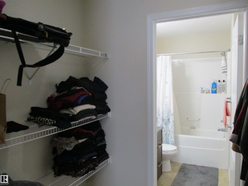 Full bath with shower / bath combo with shower curtain and vanity - 3309 9351 Simpson Drive, Edmonton, AB - Indoor Photo Showing Bathroom