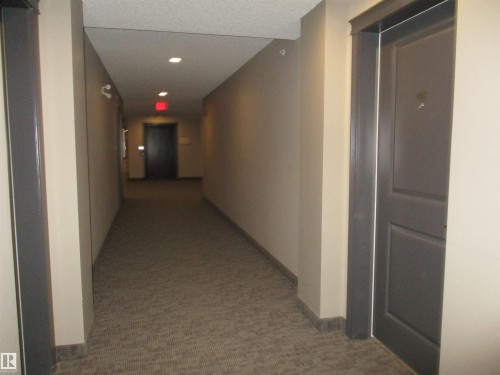 Corridor with carpet flooring, recessed lighting, and elevator - 3309 9351 Simpson Drive, Edmonton, AB - Indoor Photo Showing Other Room