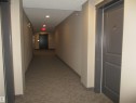 Corridor with carpet flooring, recessed lighting, and elevator - 3309 9351 Simpson Drive, Edmonton, AB  - Indoor Photo Showing Other Room 
