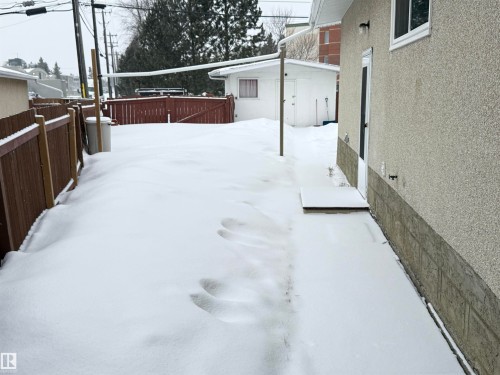 View of yard layered in snow - 9034 60 Street, Edmonton, AB - Outdoor With Exterior