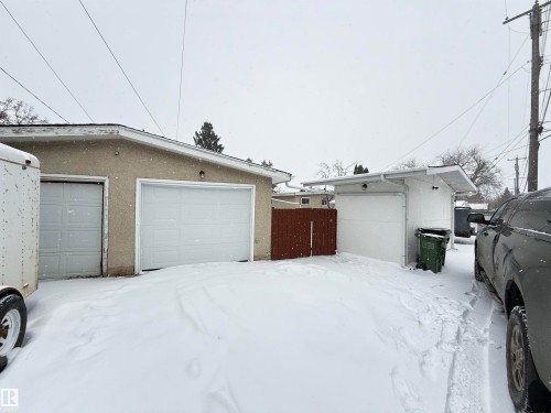 View of snow covered garage - 9034 60 Street, Edmonton, AB - Outdoor With Exterior