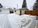 Fenced backyard featuring an outbuilding - 9034 60 Street, Edmonton, AB  - Outdoor 