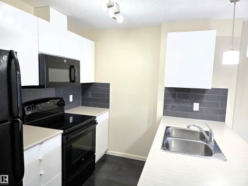 306 340 Windermere Road, Edmonton, AB - Indoor Photo Showing Kitchen With Double Sink
