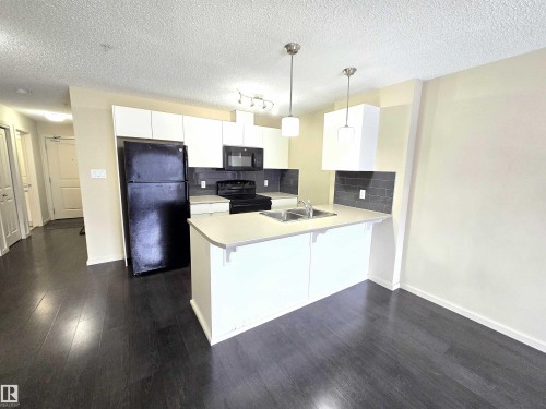 306 340 Windermere Road, Edmonton, AB - Indoor Photo Showing Kitchen With Double Sink