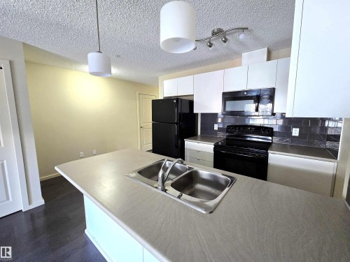 306 340 Windermere Road, Edmonton, AB - Indoor Photo Showing Kitchen With Double Sink