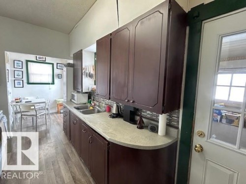 5028 50 Avenue, Chipman, AB - Indoor Photo Showing Kitchen With Double Sink