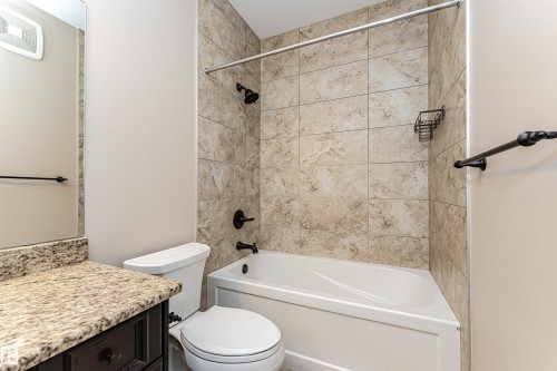 Bathroom featuring vanity and tub / shower combination - 3520 Watson Point(E), Edmonton, AB - Indoor Photo Showing Bathroom