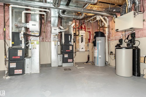 Utility room featuring water heater and electric panel - 3520 Watson Point(E), Edmonton, AB - Indoor Photo Showing Basement