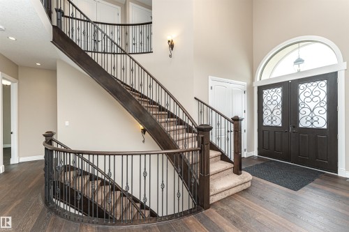 Entrance foyer with dark wood-style floors, a high ceiling, and recessed lighting - 3520 Watson Point(E), Edmonton, AB - Indoor Photo Showing Other Room