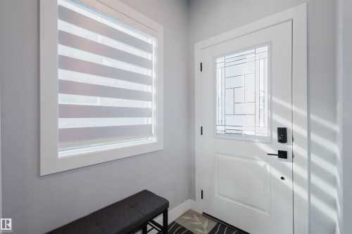Entryway featuring baseboards - 16217 32 Avenue, Edmonton, AB - Indoor Photo Showing Other Room
