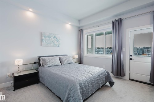 View of carpeted bedroom - 16217 32 Avenue, Edmonton, AB - Indoor Photo Showing Bedroom