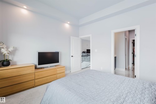 Bedroom with light colored carpet and recessed lighting - 16217 32 Avenue, Edmonton, AB - Indoor Photo Showing Bedroom