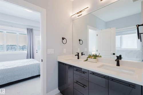 Bathroom with double vanity and ensuite bathroom - 16217 32 Avenue, Edmonton, AB - Indoor Photo Showing Bathroom