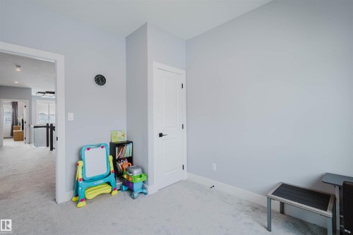 Recreation room featuring light colored carpet and baseboards - 16217 32 Avenue, Edmonton, AB - Indoor Photo Showing Other Room
