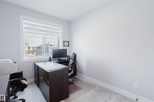 Office with baseboards and light carpet - 16217 32 Avenue, Edmonton, AB - Indoor Photo Showing Office