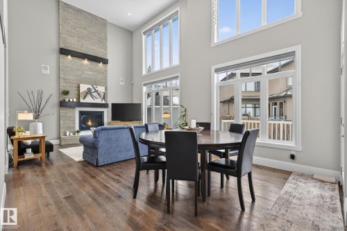 3713 Cameron Heights Place, Edmonton, AB - Indoor Photo Showing Dining Room With Fireplace