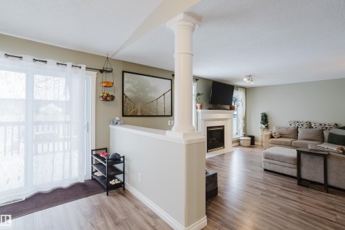 13143 37 Street, Edmonton, AB - Indoor Photo Showing Living Room With Fireplace