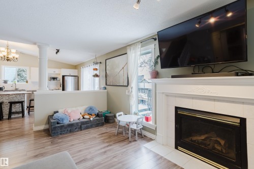13143 37 Street, Edmonton, AB - Indoor Photo Showing Living Room With Fireplace