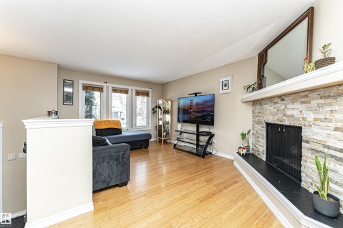 16331 119 Street Nw, Edmonton, AB - Indoor Photo Showing Living Room With Fireplace