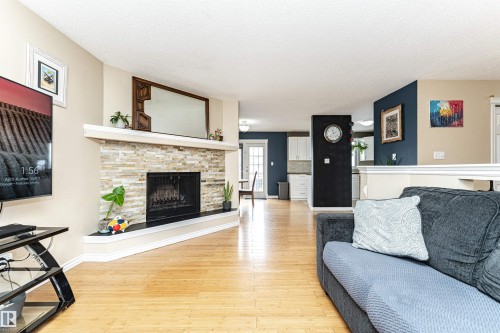 16331 119 Street Nw, Edmonton, AB - Indoor Photo Showing Living Room With Fireplace
