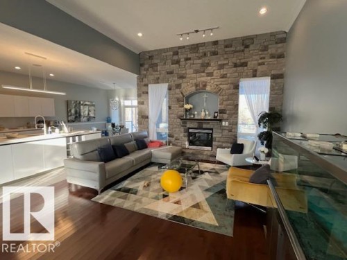 21428 25 Avenue, Edmonton, AB - Indoor Photo Showing Living Room With Fireplace