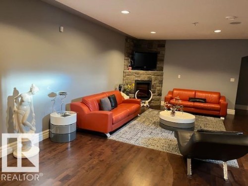 21428 25 Avenue, Edmonton, AB - Indoor Photo Showing Living Room With Fireplace