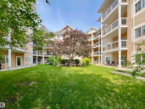 Surrounding community with a patio area - 110 10511 42 Avenue, Edmonton, AB - Outdoor With Balcony