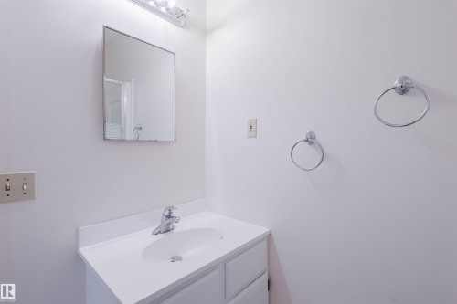 Bathroom featuring vanity - 243 Rhatigan Road E, Edmonton, AB - Indoor Photo Showing Bathroom