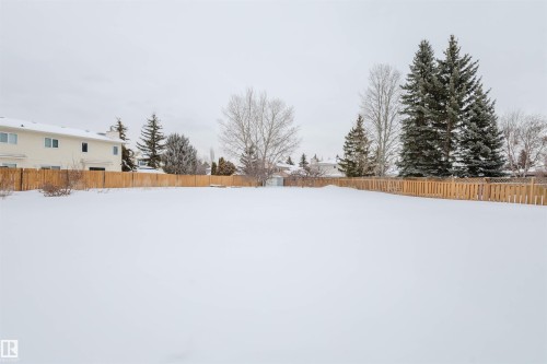 View of fenced backyard - 243 Rhatigan Road E, Edmonton, AB - Outdoor