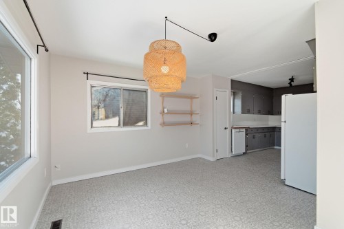 Unfurnished dining area with baseboards - 12225 134 Street, Edmonton, AB - Indoor