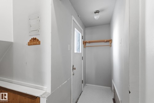 Corridor with baseboards - 12225 134 Street, Edmonton, AB - Indoor Photo Showing Other Room