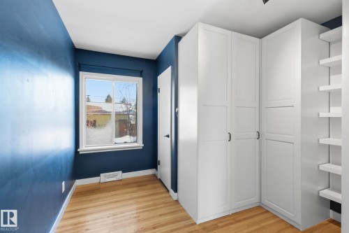 Corridor featuring light wood-style floors and baseboards - 12225 134 Street, Edmonton, AB - Indoor Photo Showing Other Room