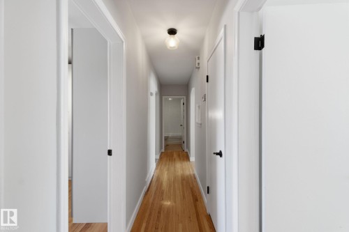 Corridor featuring light wood-style flooring and baseboards - 12225 134 Street, Edmonton, AB - Indoor Photo Showing Other Room