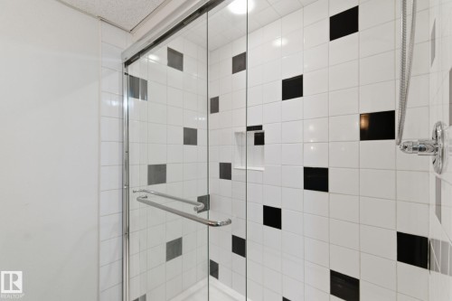 Full bath featuring a stall shower - 12225 134 Street, Edmonton, AB - Indoor Photo Showing Bathroom