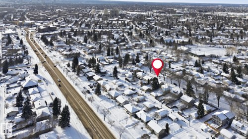 Snowy aerial view featuring a residential view - 12225 134 Street, Edmonton, AB - Outdoor With View