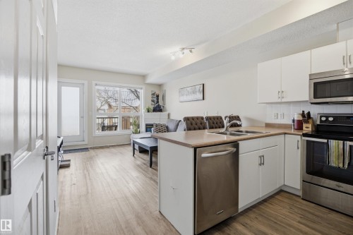 402 11109 84 Avenue, Edmonton, AB - Indoor Photo Showing Kitchen With Stainless Steel Kitchen With Double Sink
