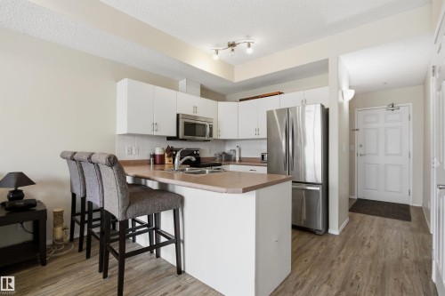 402 11109 84 Avenue, Edmonton, AB - Indoor Photo Showing Kitchen With Stainless Steel Kitchen With Double Sink