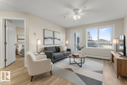 201 5340 199 Street, Edmonton, AB - Indoor Photo Showing Living Room