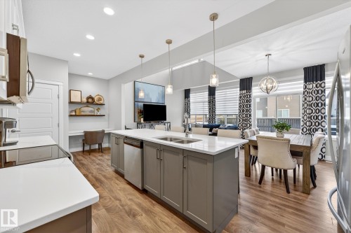 1212 Cy Becker Road, Edmonton, AB - Indoor Photo Showing Kitchen With Double Sink With Upgraded Kitchen