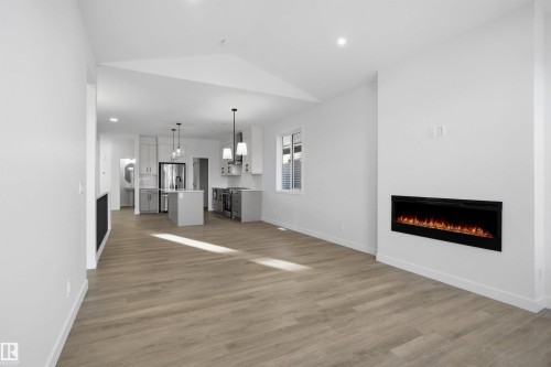 3704 Cross Landing, Edmonton, AB - Indoor Photo Showing Living Room With Fireplace