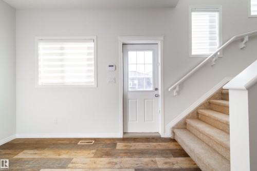 Entryway featuring plenty of natural light and wood finished floors - 1199 Watt Drive, Edmonton, AB - Indoor Photo Showing Other Room