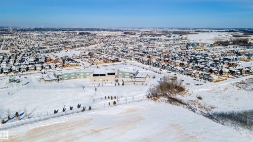 Snowy aerial view with a residential view - 1199 Watt Drive, Edmonton, AB - Outdoor With View