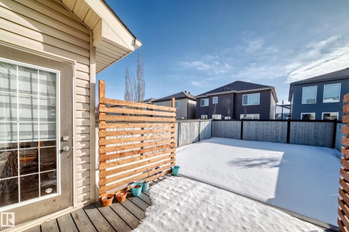 Wooden terrace featuring a residential view - 17357 8A Avenue, Edmonton, AB 