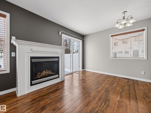 138 16823 84 Street, Edmonton, AB - Indoor Photo Showing Living Room With Fireplace